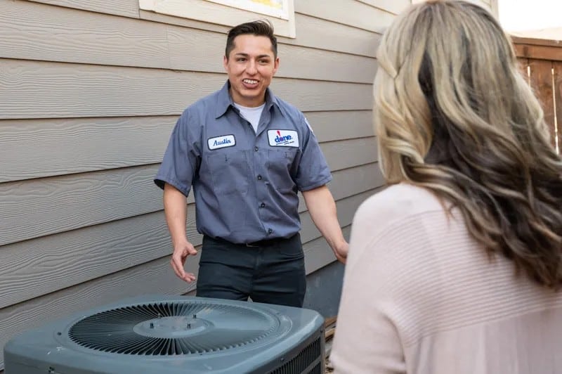 A Done technician talking through options with a Denver homeowner