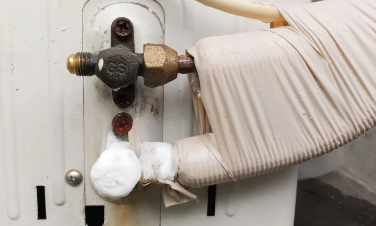 A photo of an AC unit frozen over