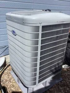 Carrier heat pump installed outside home in Littleton CO