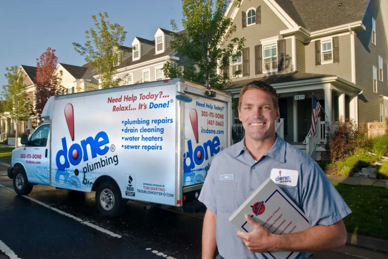A Done technician and box truck outside a home.