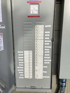 Opened Leviton box showing marked circuit breakers