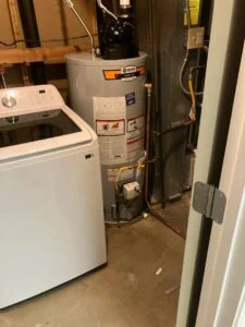 A newly installed water heater in a basement in a home in Aurora, CO