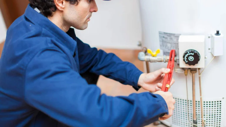 Plumber working on a water heater
