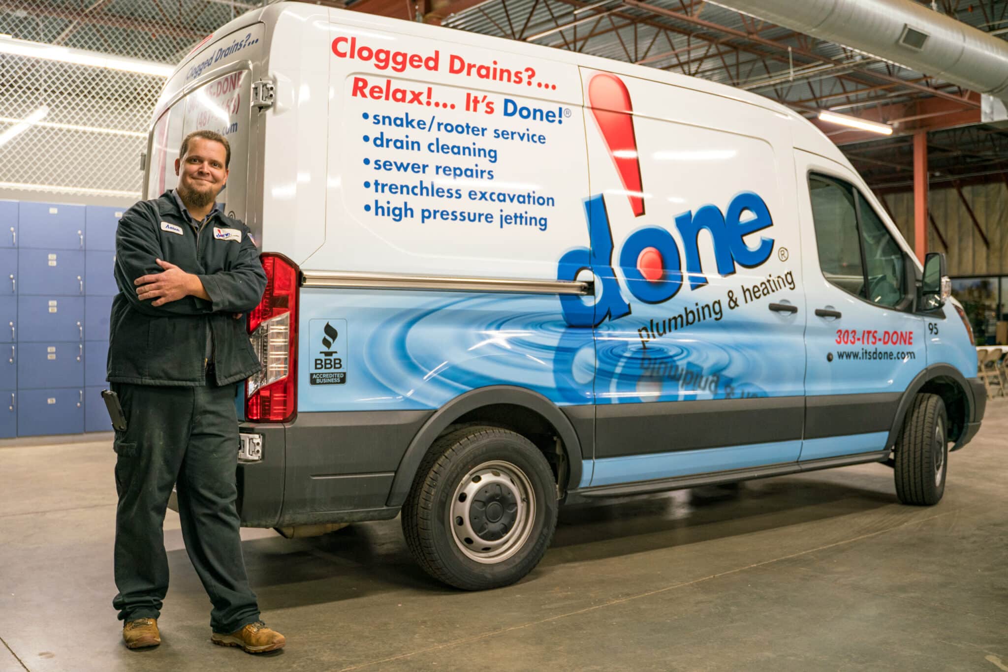 A Done technician next to his work van