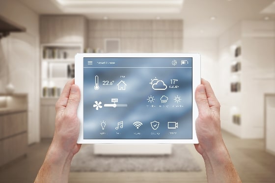 A smart home tablet showing various smart home devices