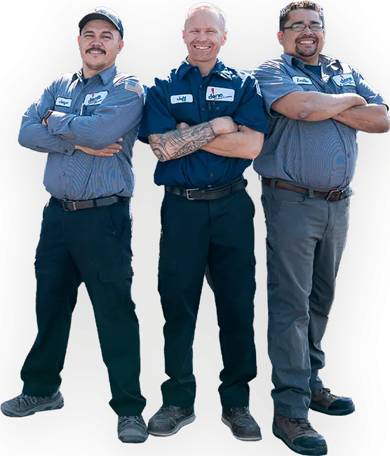 Three Done technicians standing happily together.