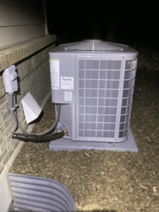 Side view of air conditioner installation with electrical and refrigerant connections Castle Rock CO
