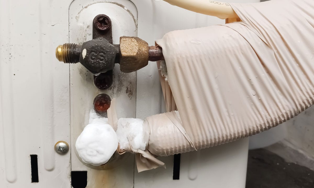 A photo of an AC unit frozen over