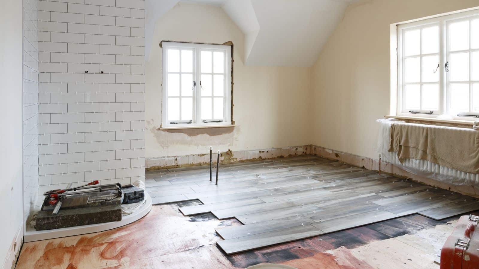 A bathroom stripped to the studs during a remodel