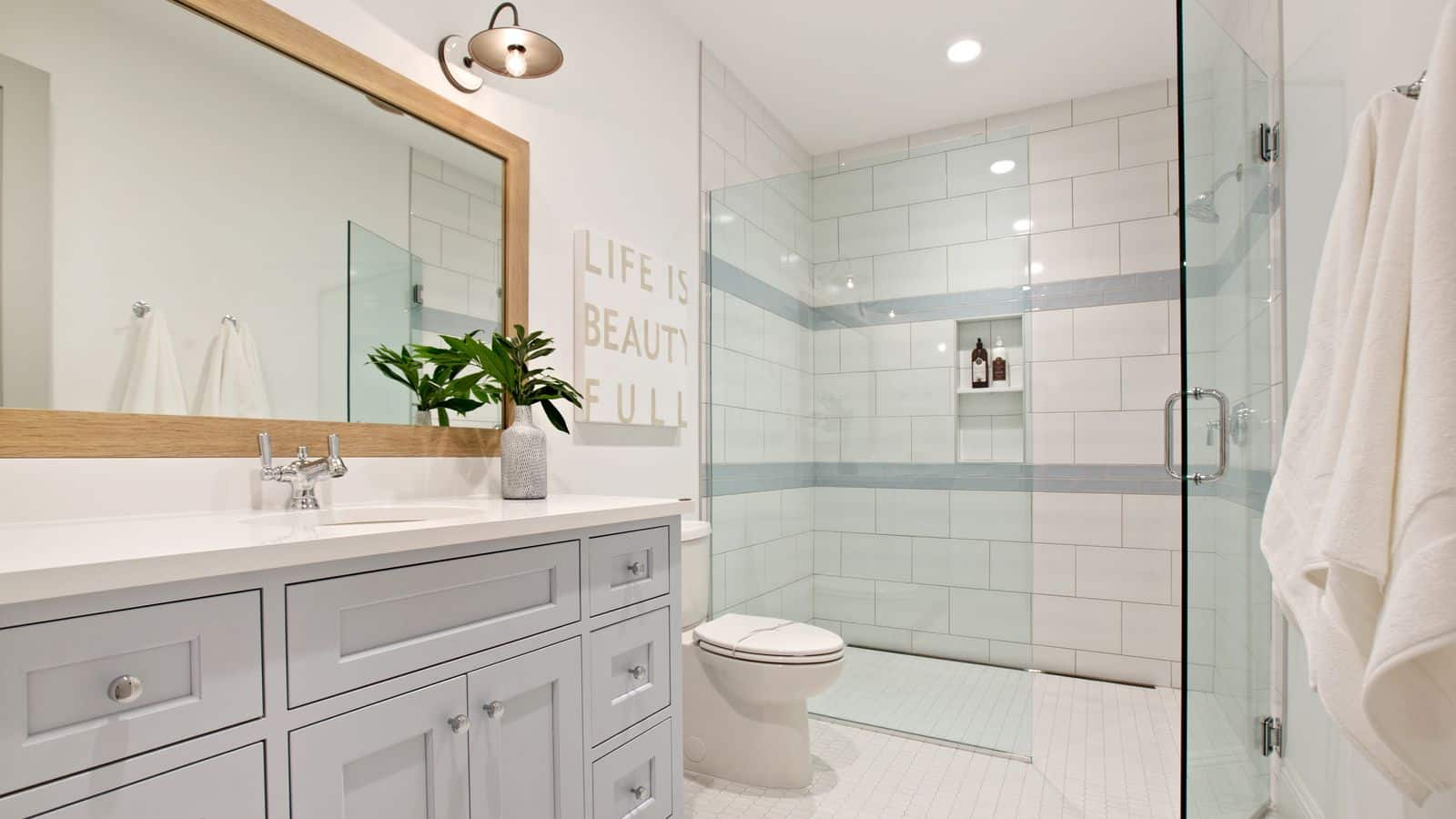 Modern bathroom with toilet and walk-in shower