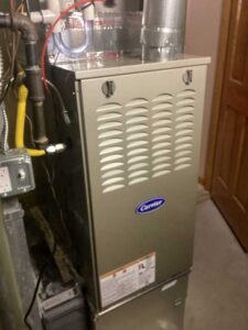 Carrier Performance gas furnace installed during full HVAC installation in Centennial