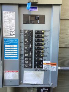 Electrical panel updated and reconnected for new heat pump and furnace installation in Thornton