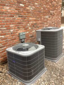 Dual Carrier air conditioning units installed outside Centennial home