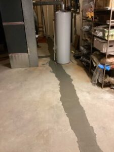 Interior drain line excavation complete with cement floor replaced