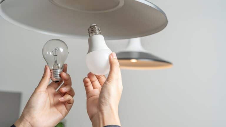 Replacing standard lightbulb with energy efficient ones