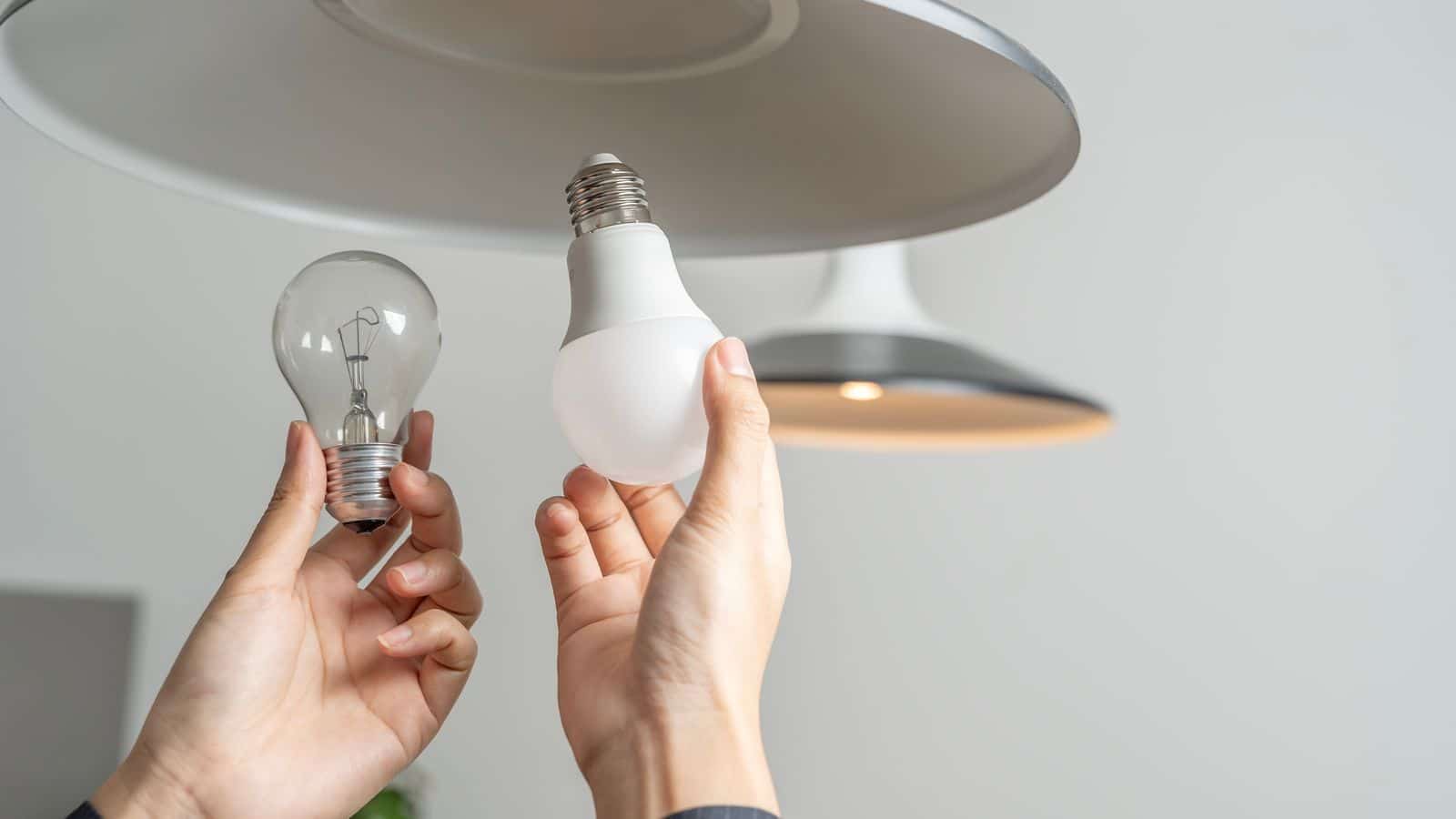 Replacing standard lightbulb with energy efficient ones